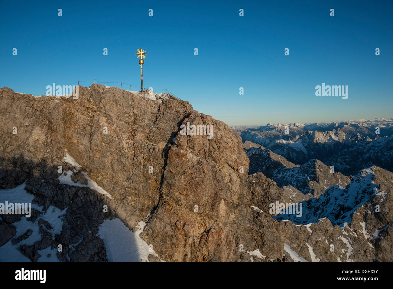 Summit cross on Mount Zugspitze, Garmisch-Partenkirchen, Grainau, Upper Bavaria, Bavaria, Zugspitze, Wetterstein mountain range Stock Photo