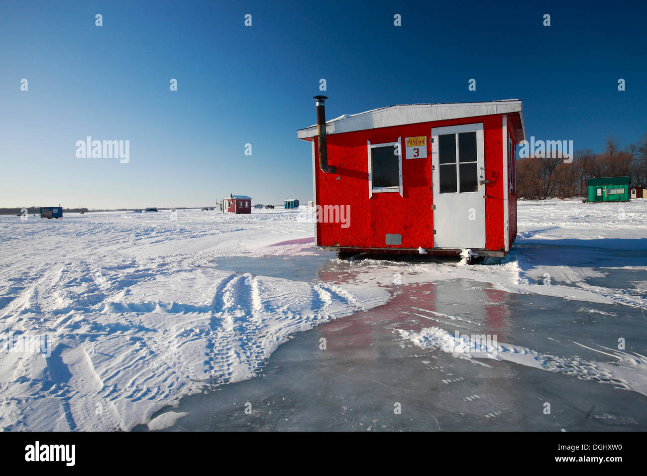 Ice fishing huts on the Saint Lawrence River, Quebec, Canada Stock