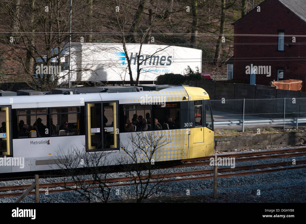 Metrolink tram on the Oldham-Rochdale line in the Beal valley near Jubilee, just north of Shaw, Oldham, Manchester, England, UK Stock Photo