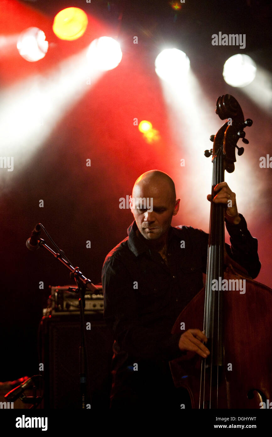 Ryser C., bassist of the Swiss country and rockabilly band Hell's Kitchen live in the Schueuer concert hall, Lucerne Stock Photo