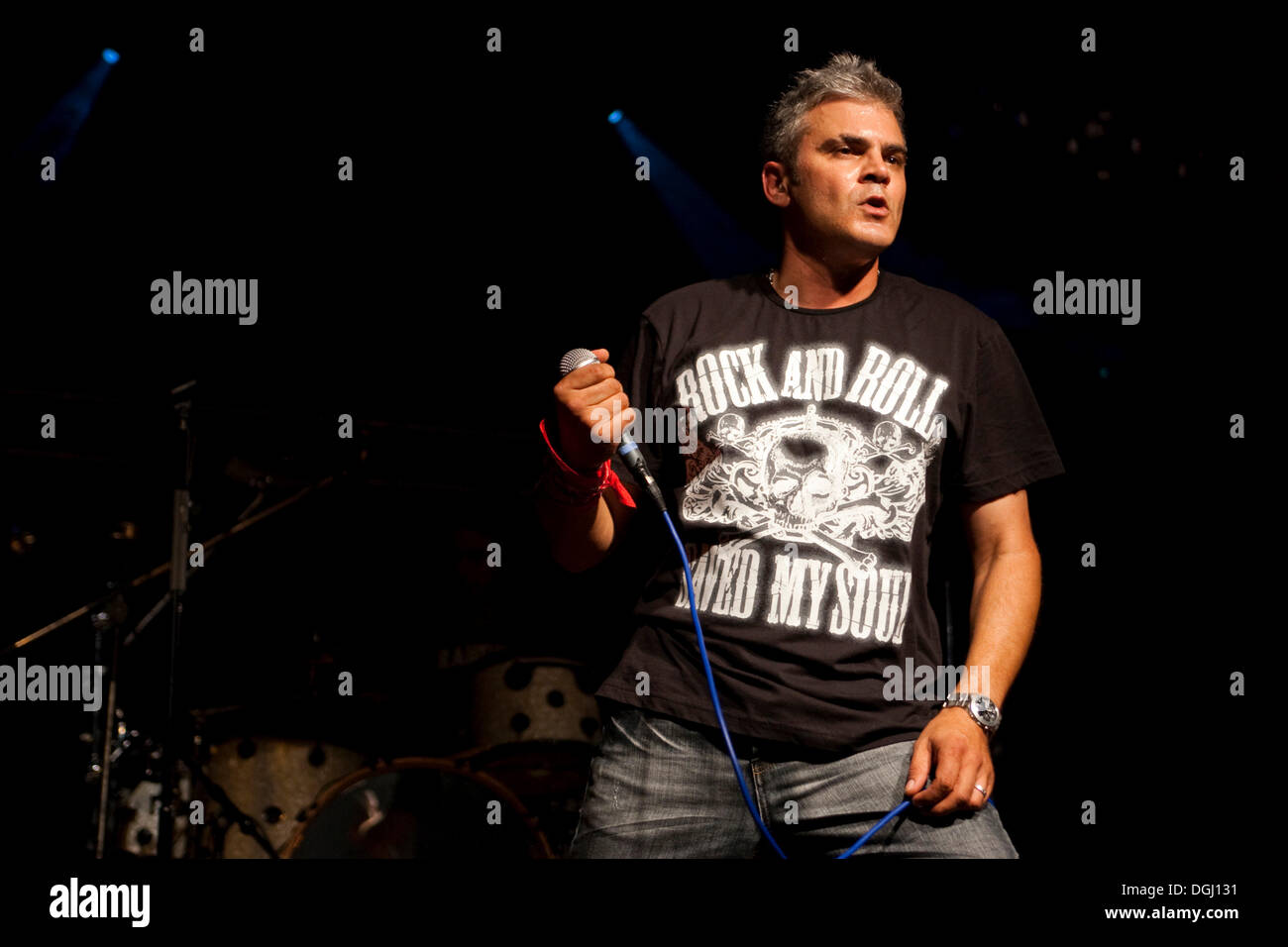 Eric St. Michaels, singer and front man of the Swiss rock band China live  at the Rockparty in the multipurpose hall in Stock Photo - Alamy