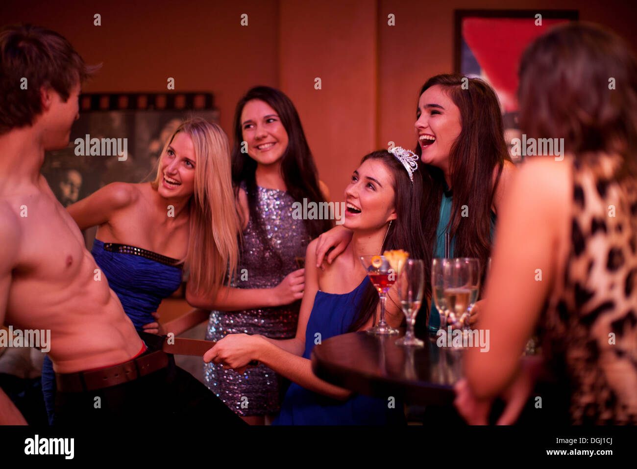Young Women Watching Male Stripper At Hen Party Stock Photo Alamy
