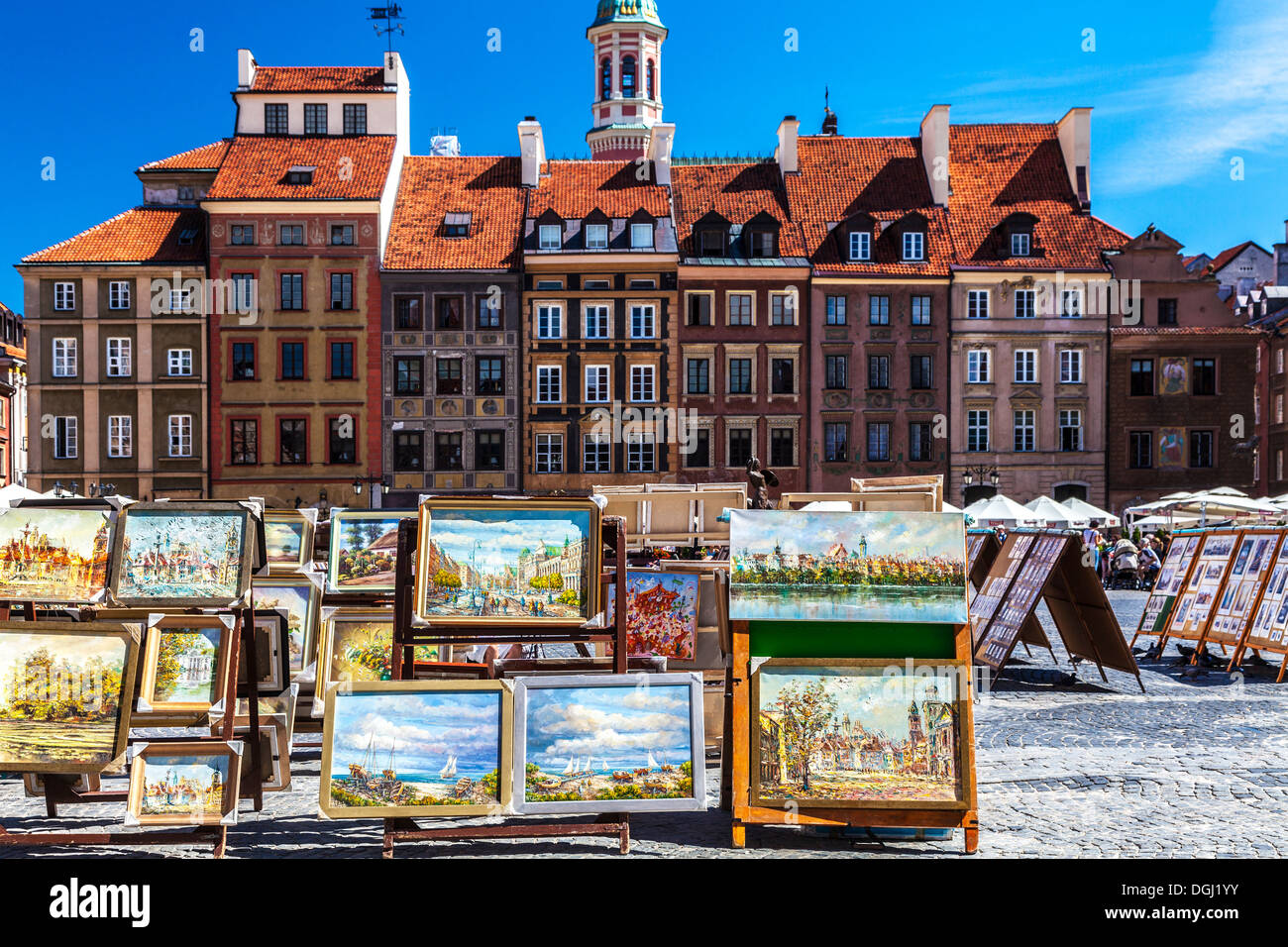 Open air display of paintings for sale to tourists in Stary Rynek in Warsaw. Stock Photo