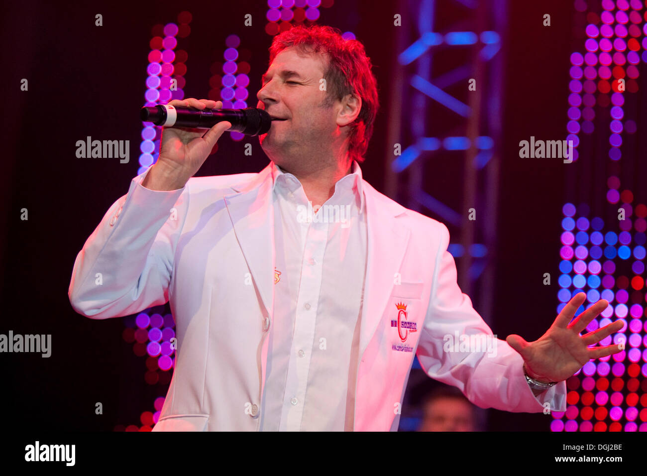 Gottfried Wuercher, singer and front man of the Austrian folk music group Nockalm Quintett performing live at the 10th Stock Photo