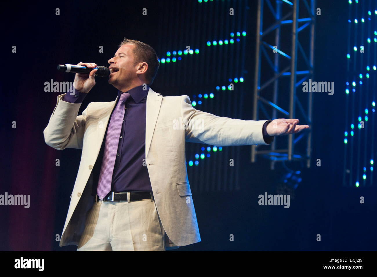 Swiss pop singer and moderator Leonard performing live at the 10th Schlager-Night in the new Allmend Festival Hall, Lucerne Stock Photo