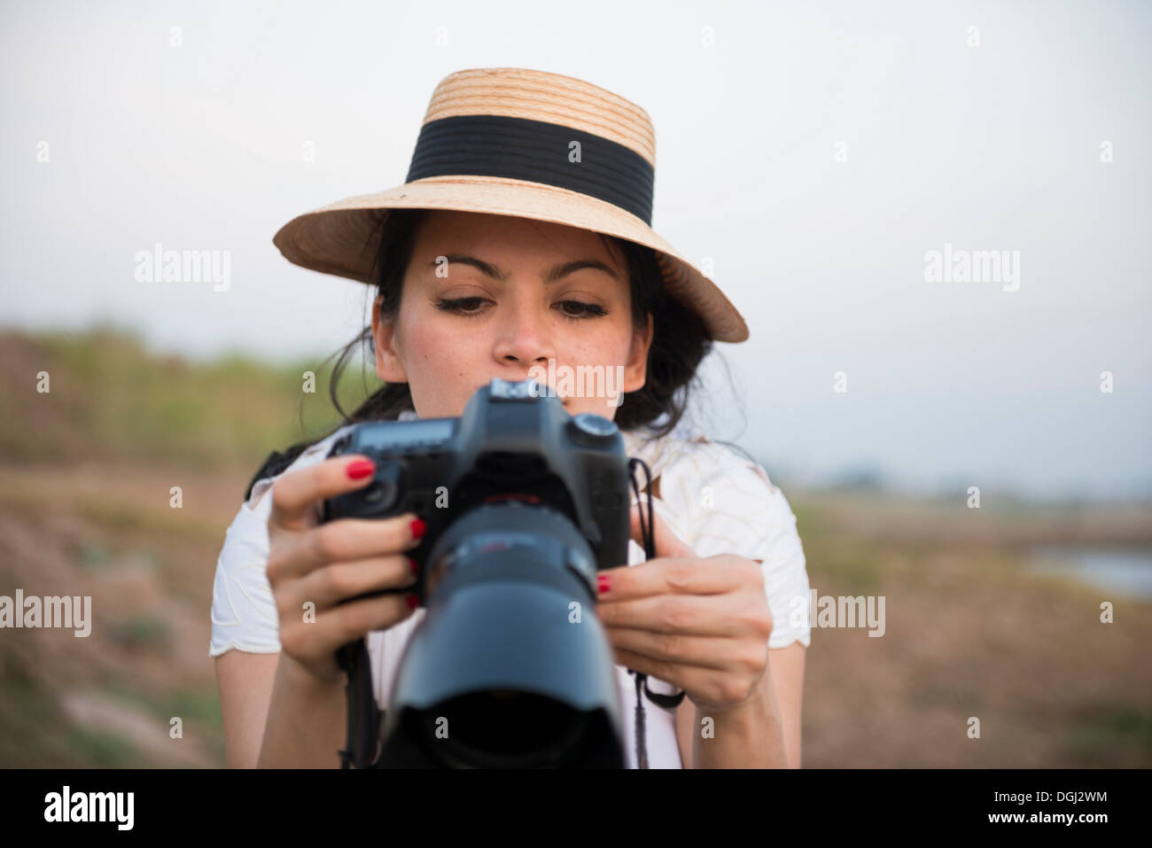 Woman wearing hat taking hi-res stock photography and images - Alamy
