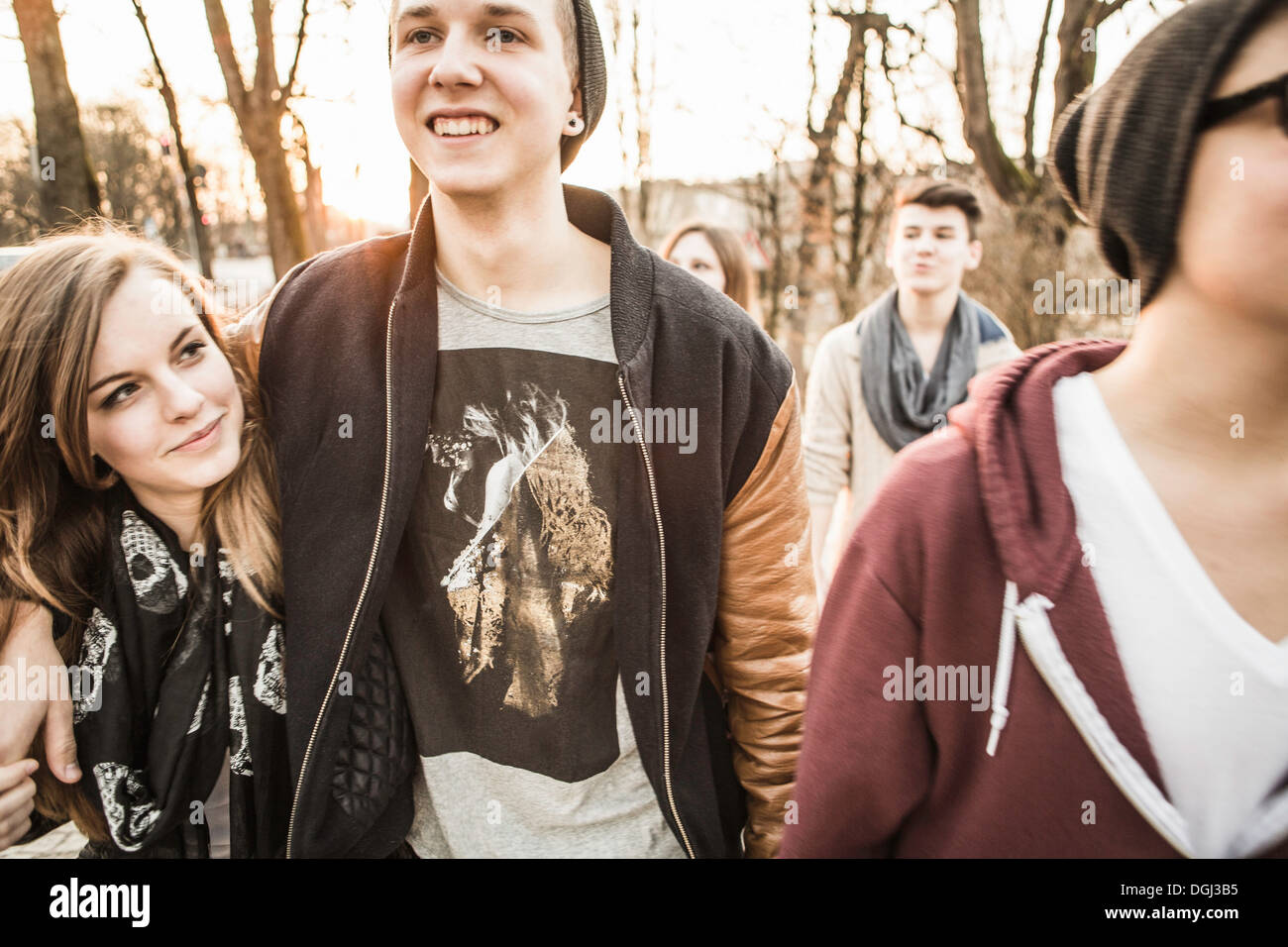 Five teenagers walking together Stock Photo