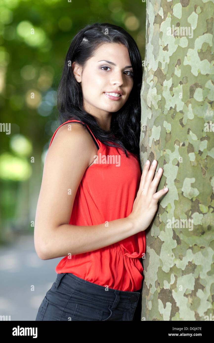Woman in red top looks hi-res stock photography and images - Alamy