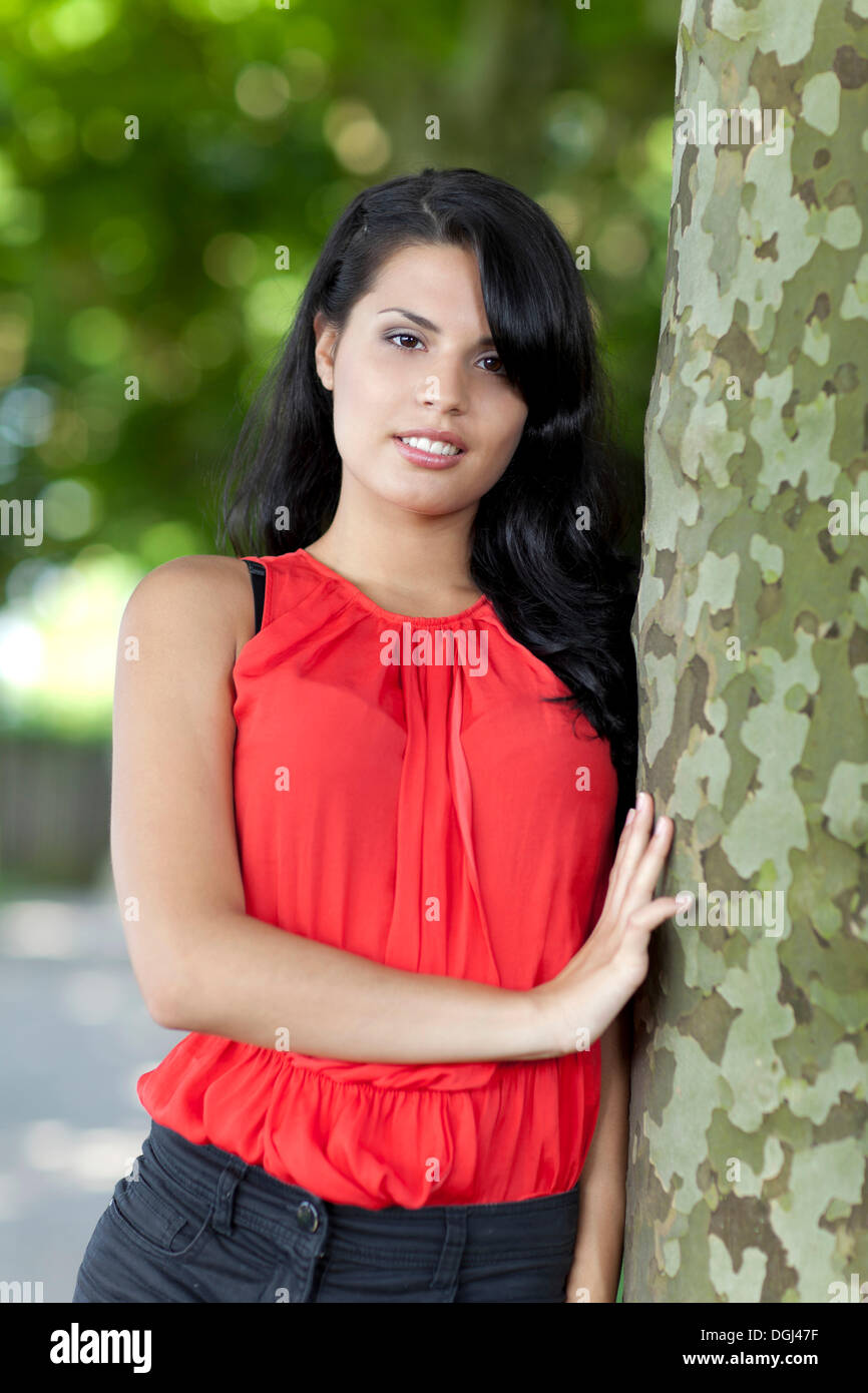 Woman in red top looks hi-res stock photography and images - Alamy