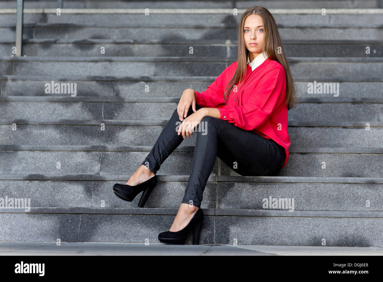 black jeans and high heels posing 