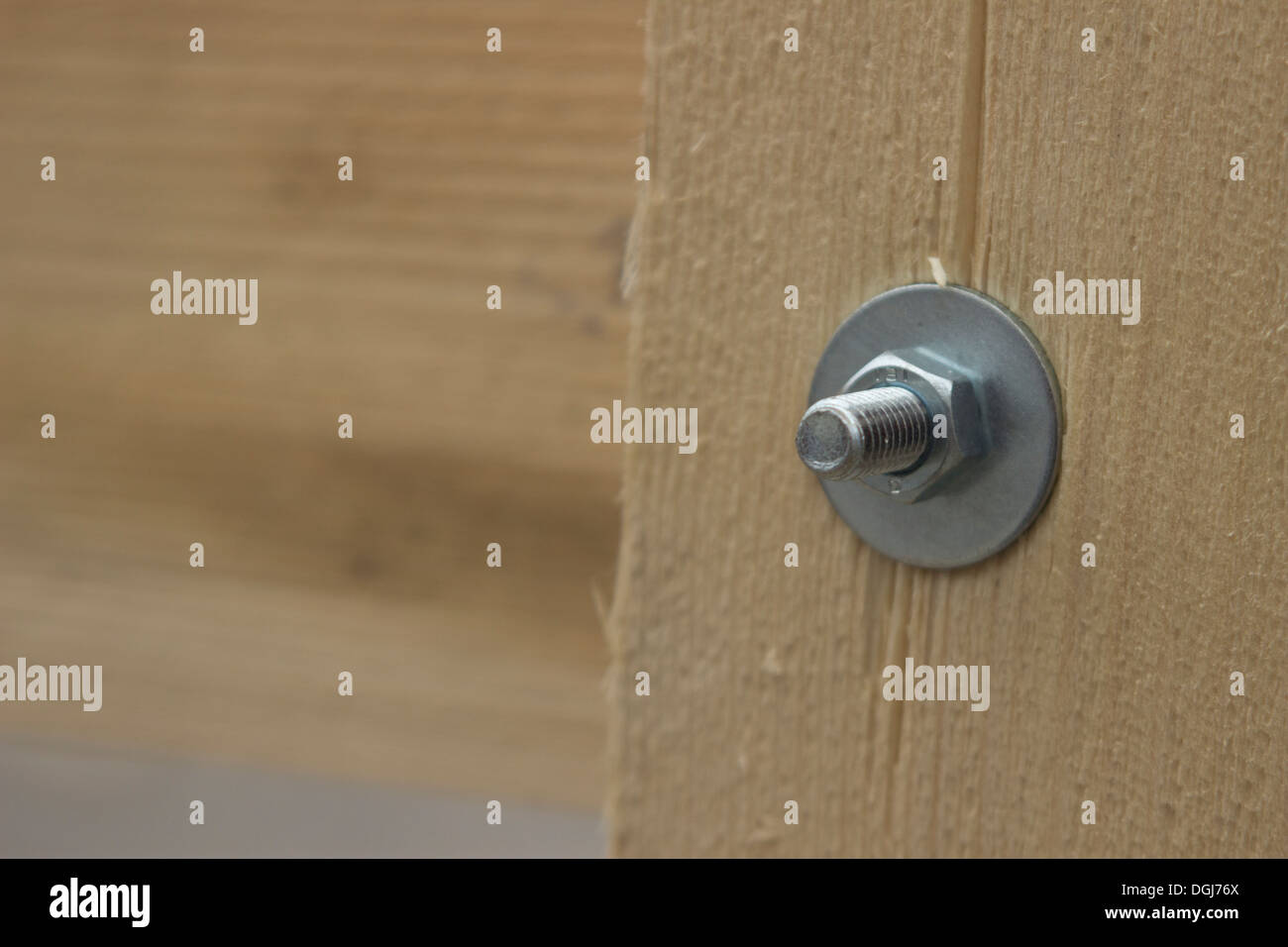 nut bolt screw tightening on a wood beam Stock Photo Alamy