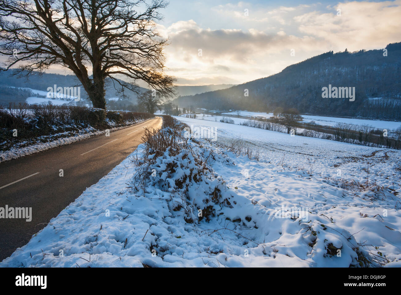 Stowe road leading into a snow covered Lower Wye Valley. Stock Photo