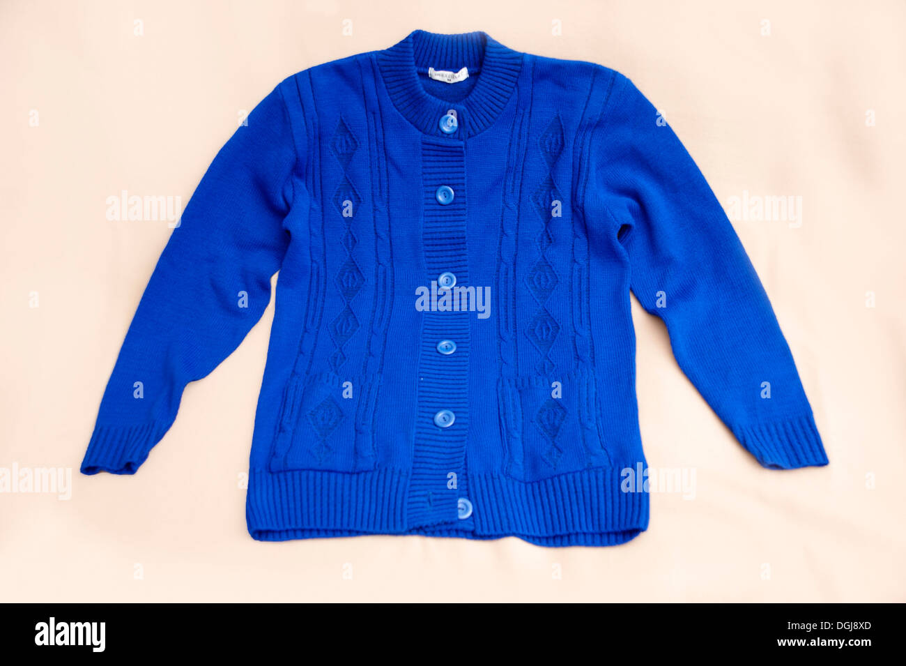 Ladies / womens cardigan in a shade of navy blue Stock Photo