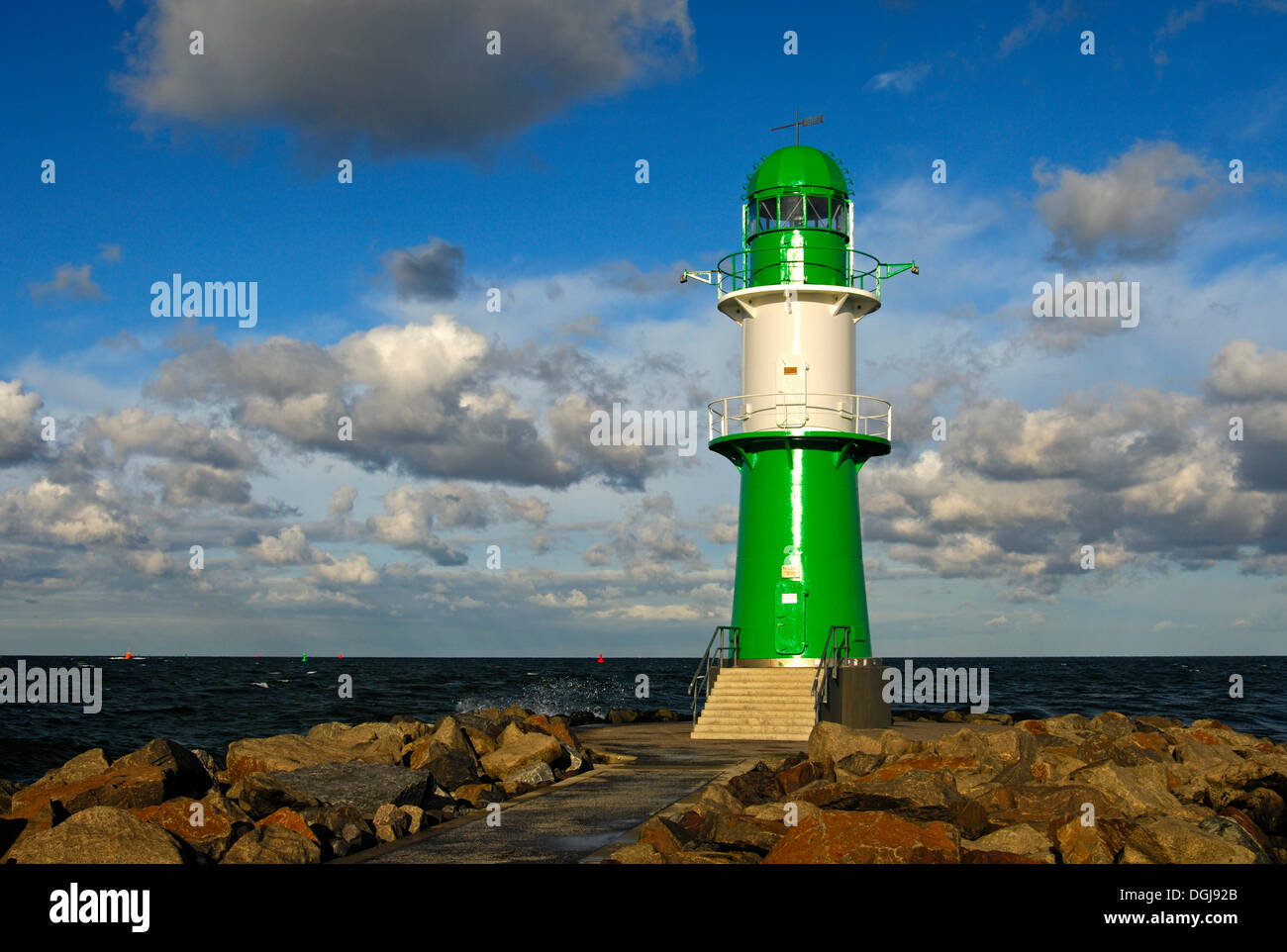 Green-white lighthouse on the Warnemuende mole, Rostock-Warnemuende, Mecklenburg-Western Pomerania Stock Photo