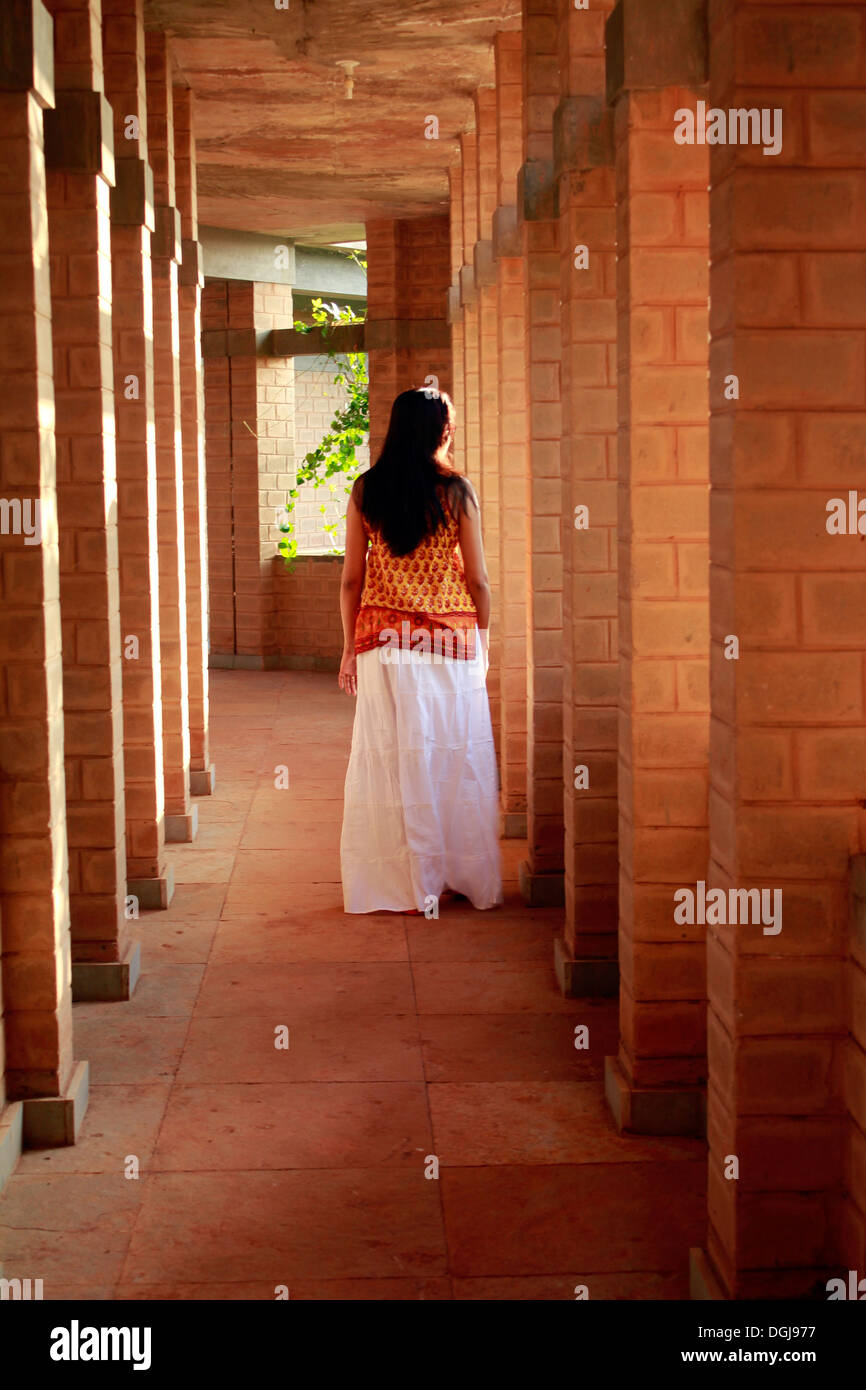 Woman long skirt walking away hi-res stock photography and images - Alamy