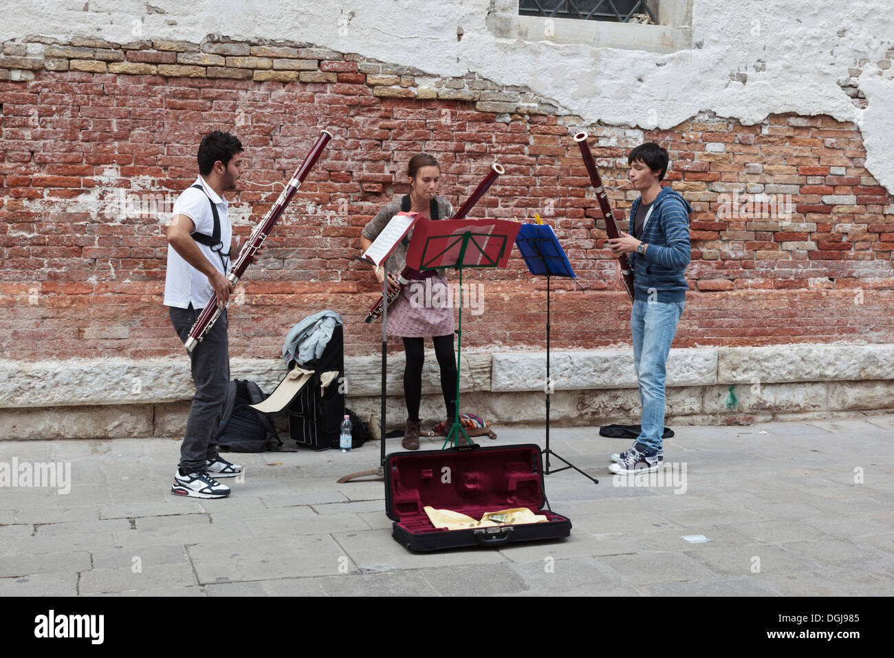 Music students busking in the Accademia district of Venice. Stock Photo