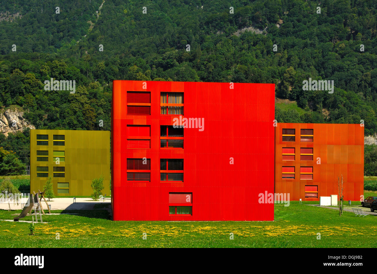 Colourful multi-family houses in the Les Iles residential quarter, St Maurice, Valais, Switzerland, Europe Stock Photo