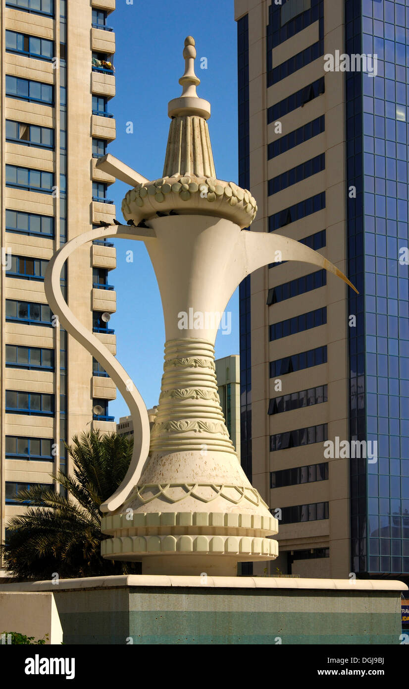 Large sculpture of a traditional Arab coffee pot, dallah, as a symbol of Arab hospitality and tradition, on Ittihad Square or Stock Photo