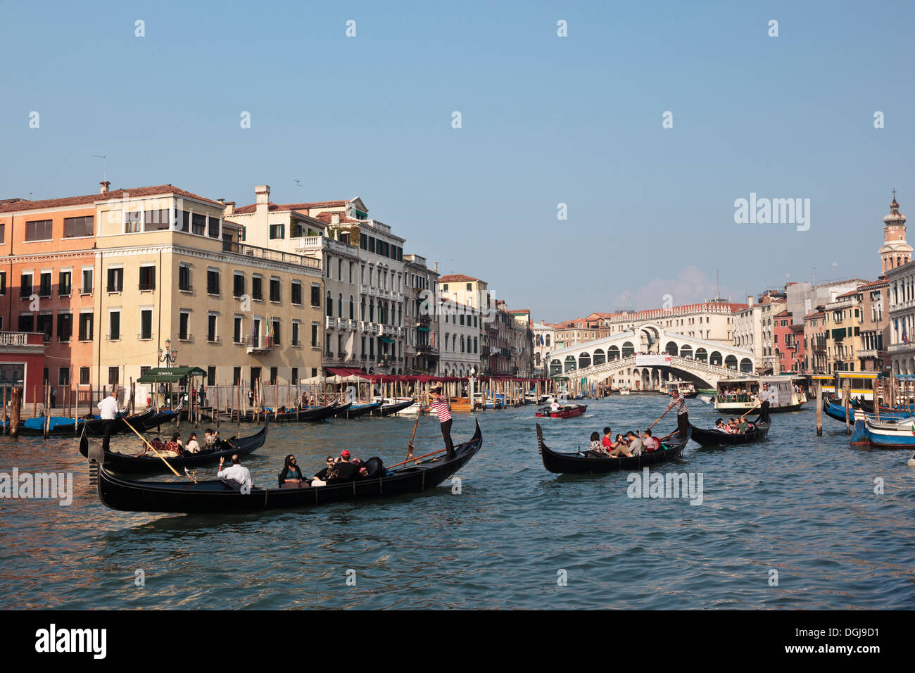 Gondola trips along the Grand Canal in Venice. Stock Photo