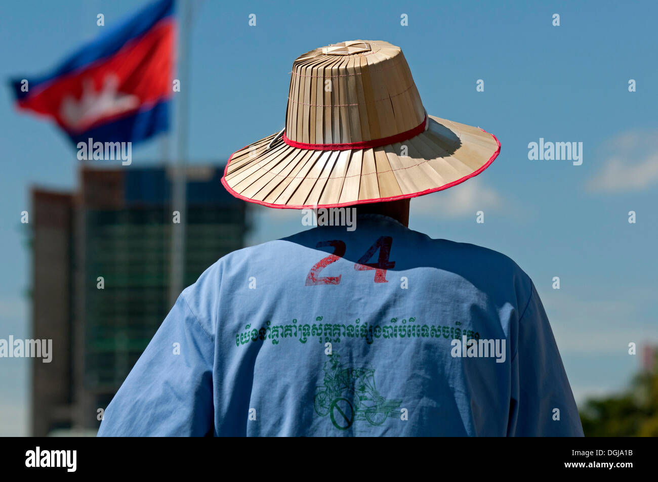 Rickshaw driver wearing a straw hat, Phnom Penh, Cambodia, Southeast