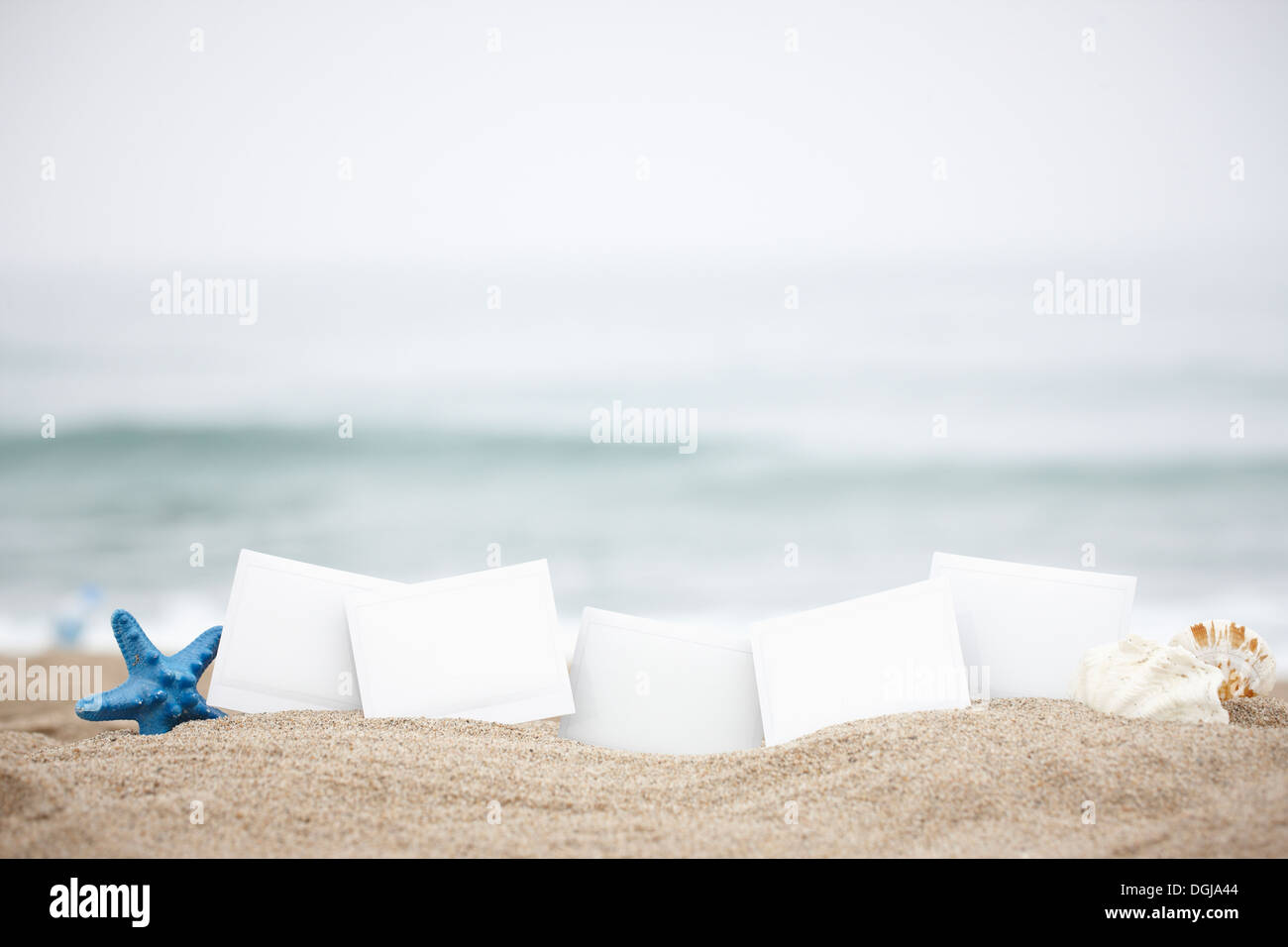 several white papers on the beach Stock Photo