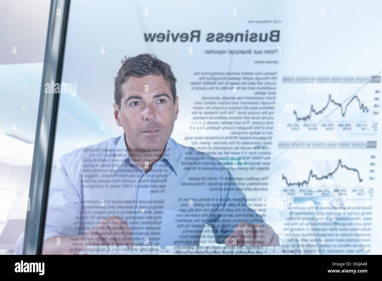 Journalist and blogger reading news, view through screen Stock Photo