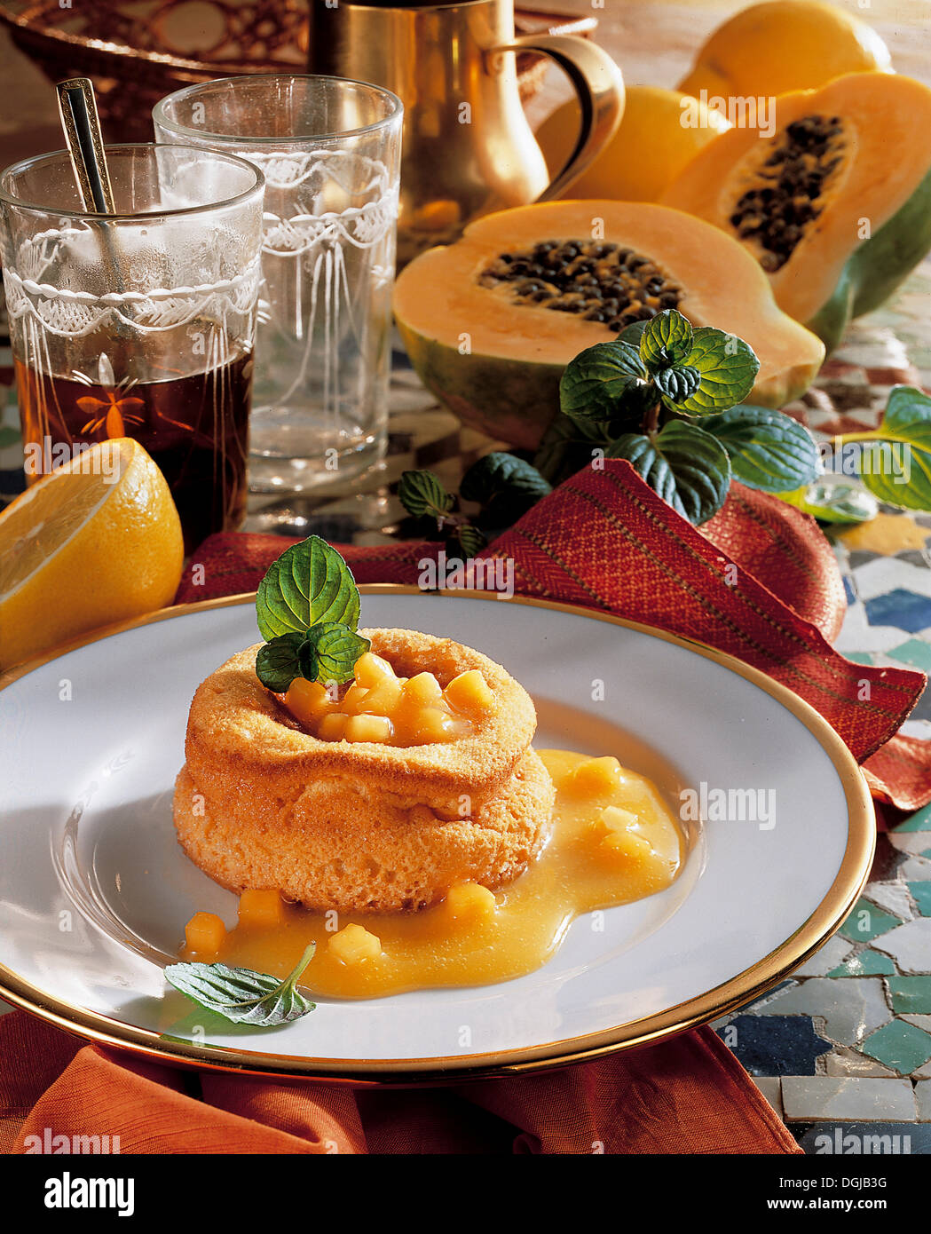 Papaya souffle on a plate, Morocco. Stock Photo