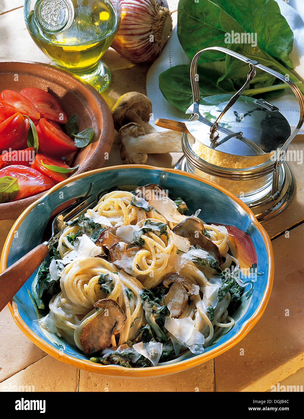 Mushroom and spinach spaghetti, Italy Stock Photo Alamy