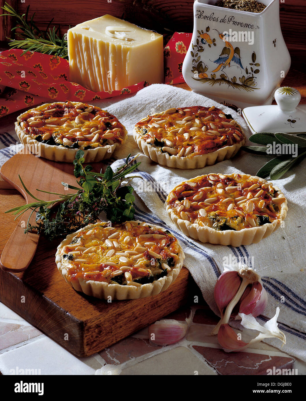 Herb and cheese tarts, France. Stock Photo