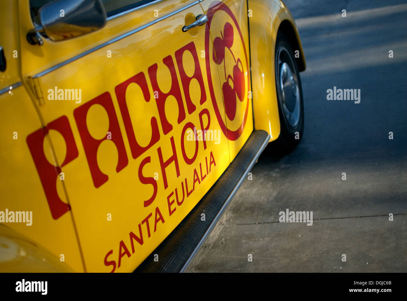 Pacha shop advertising in a Volkswagen Beetle yellow car Stock Photo