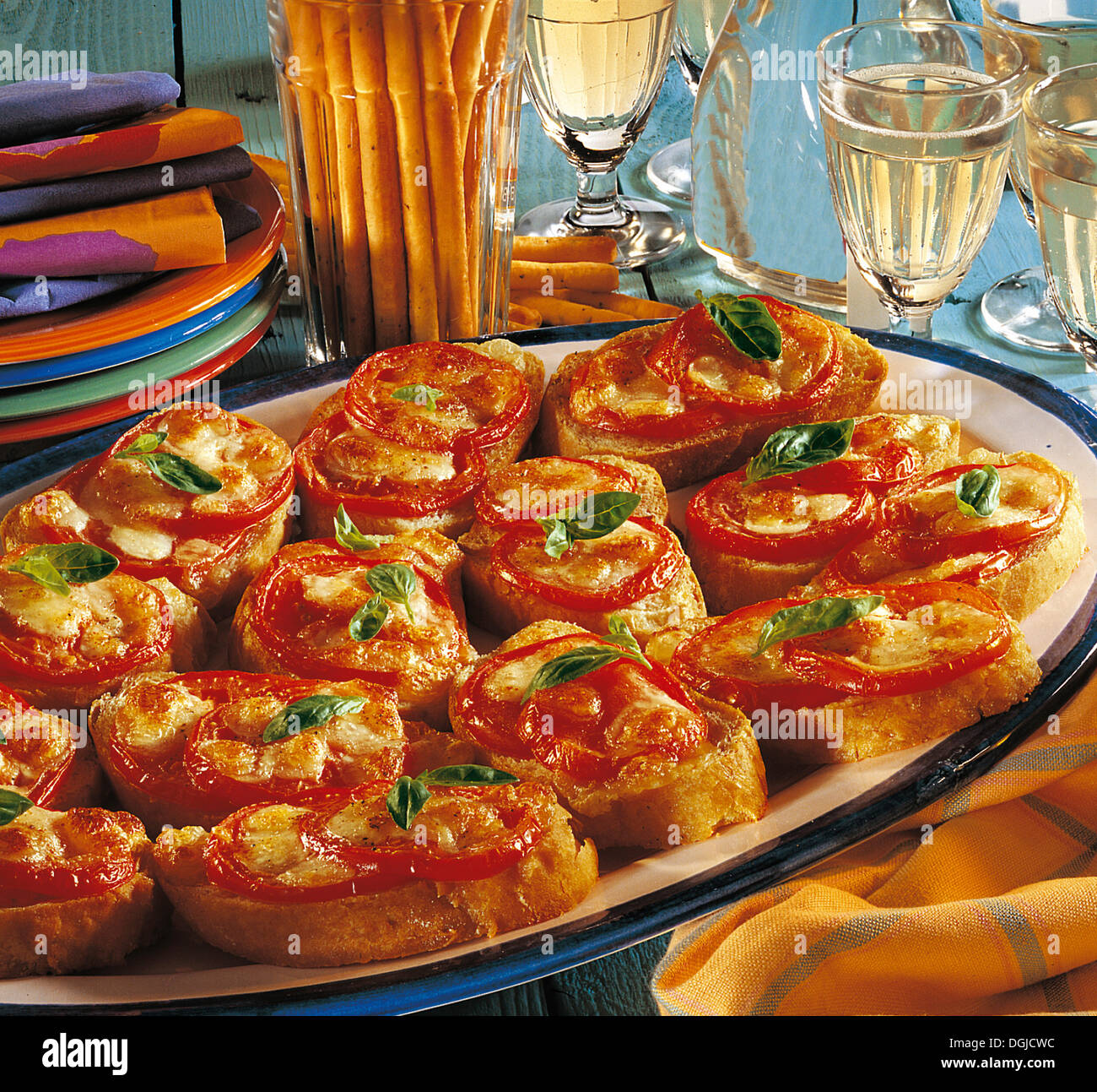 Tomato-mozzarella crostini, Italy Stock Photo - Alamy
