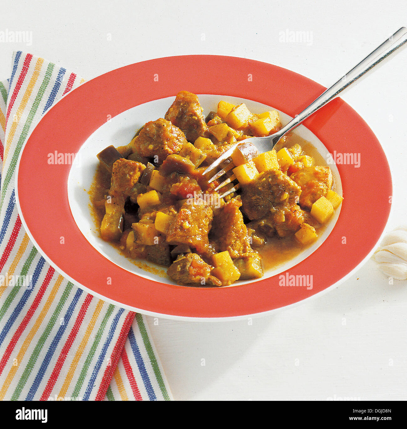 Pork curry with vegetables, Guadeloupe. Stock Photo