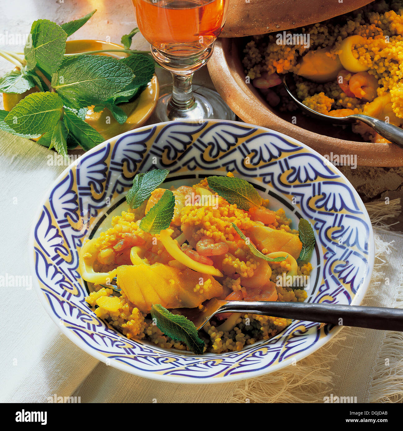 Millet pilaf with seafood, Israel. Stock Photo