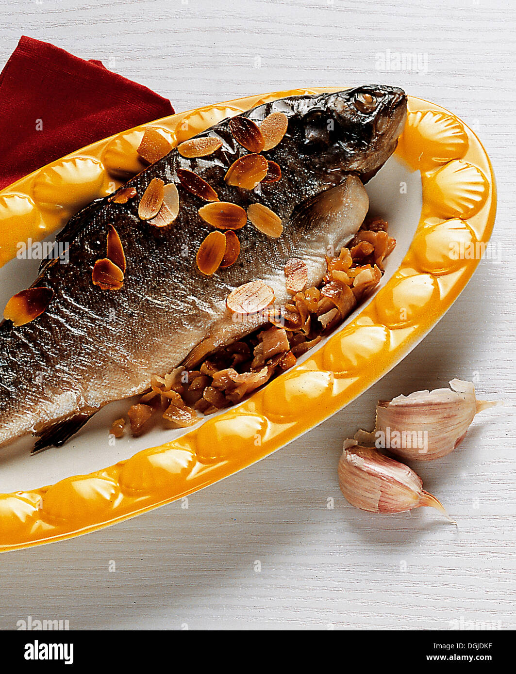 Trout with Serrano ham and sliced almonds, Spain. Stock Photo