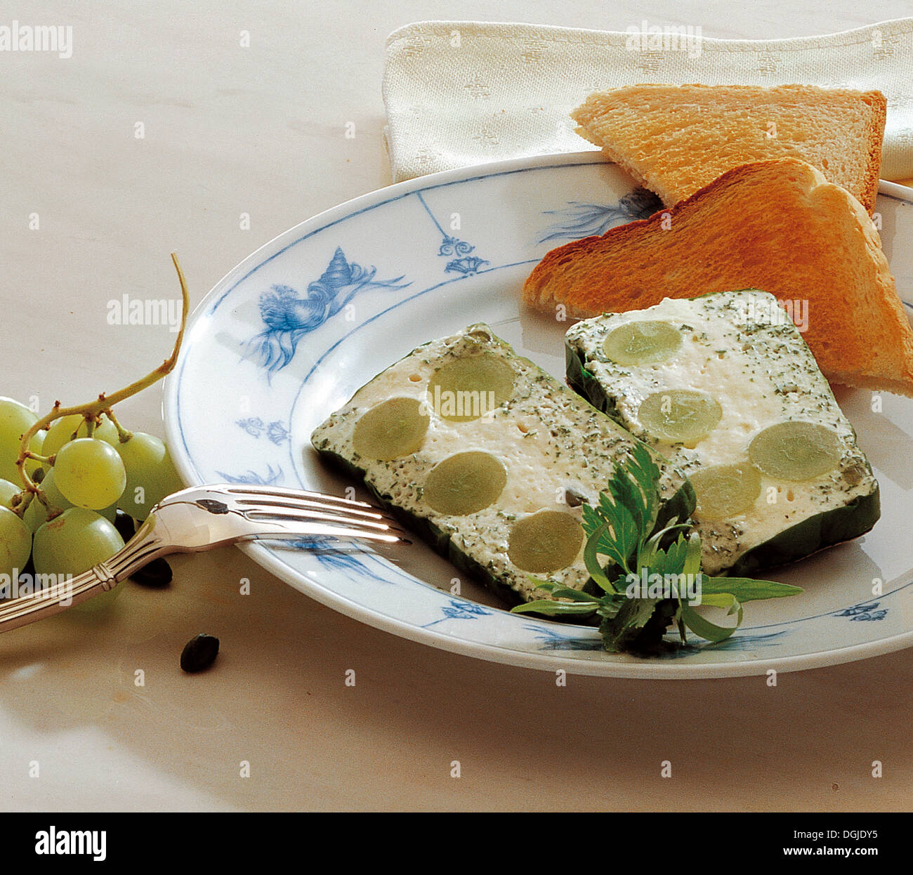 Cheese terrine with grapes, cold starter, Australia. Stock Photo