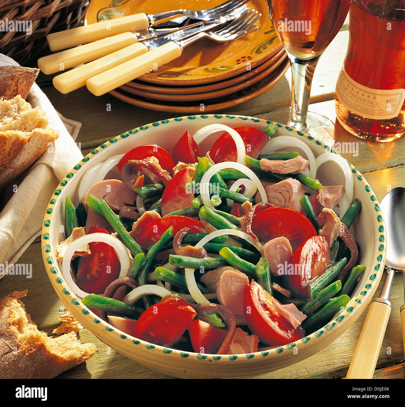 Salad Nicoise, French classic with green beans, tomatoes, anchovies and pickled tuna, France. Stock Photo