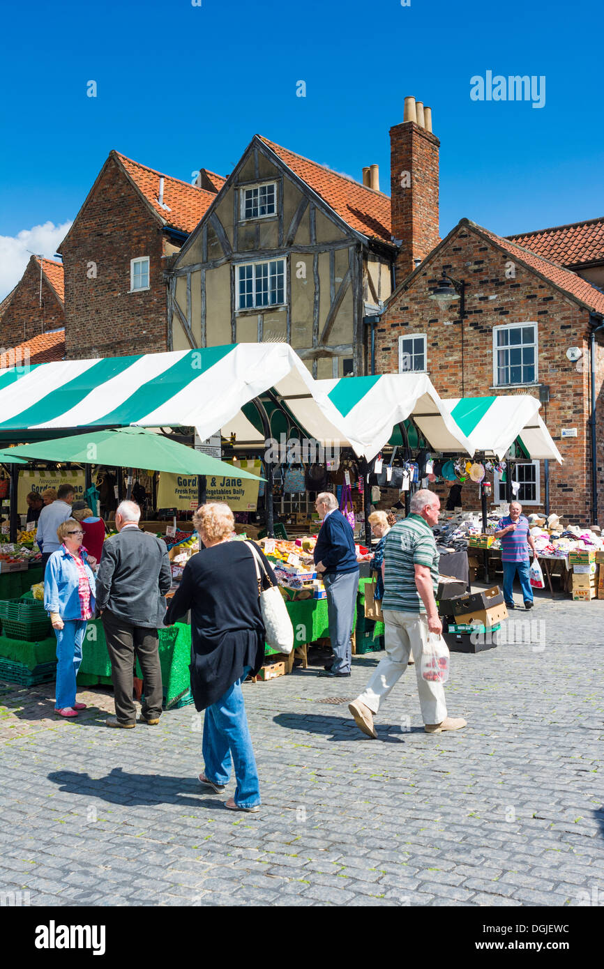 People buying groceries at Newgate Market in York. Stock Photo