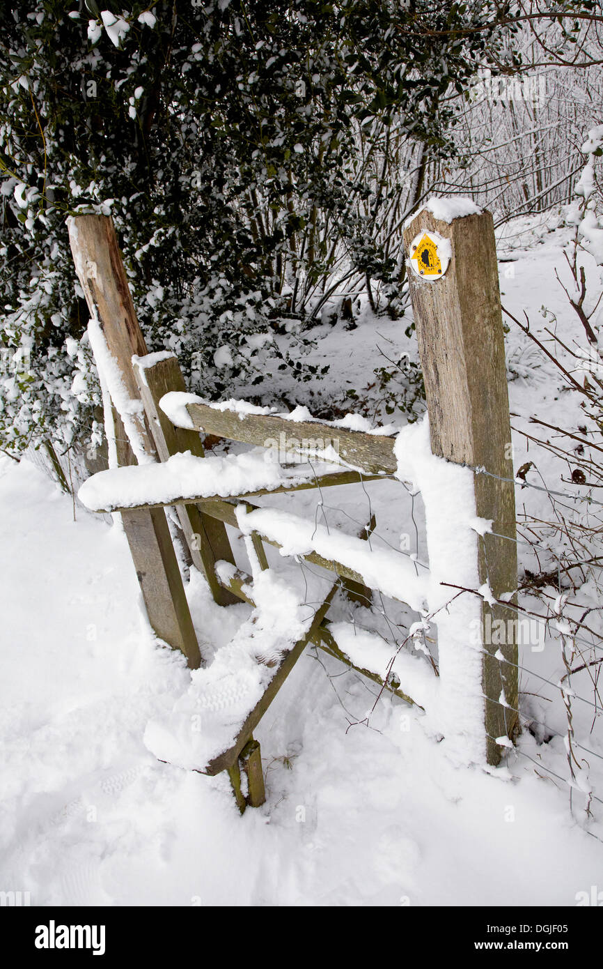 Footpath sign in snow. Stock Photo