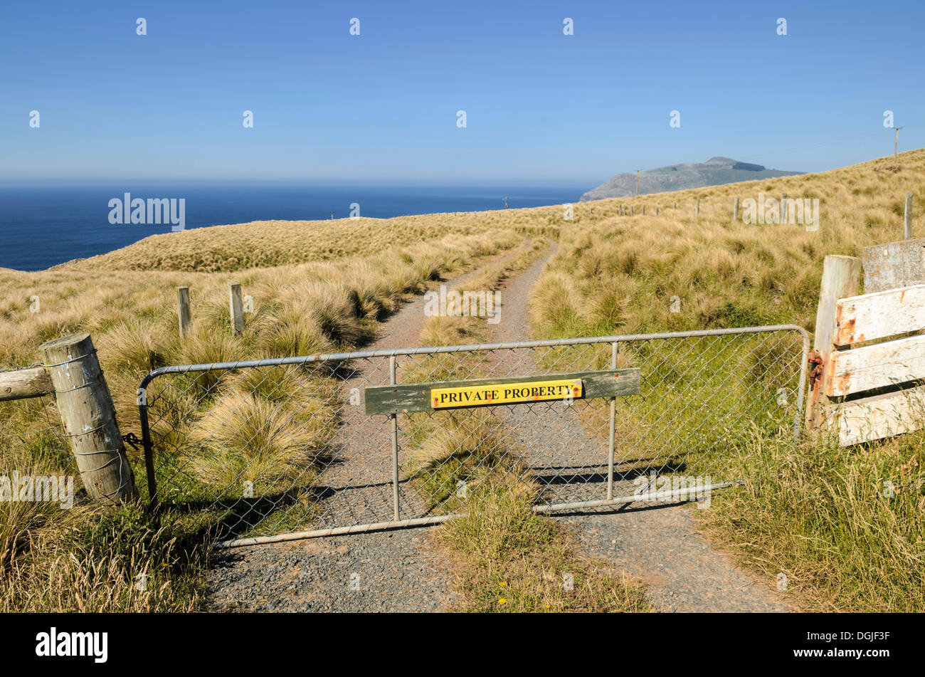 Gate with a sign, Private Property, Otago, South Island, New Zealand, Oceania Stock Photo