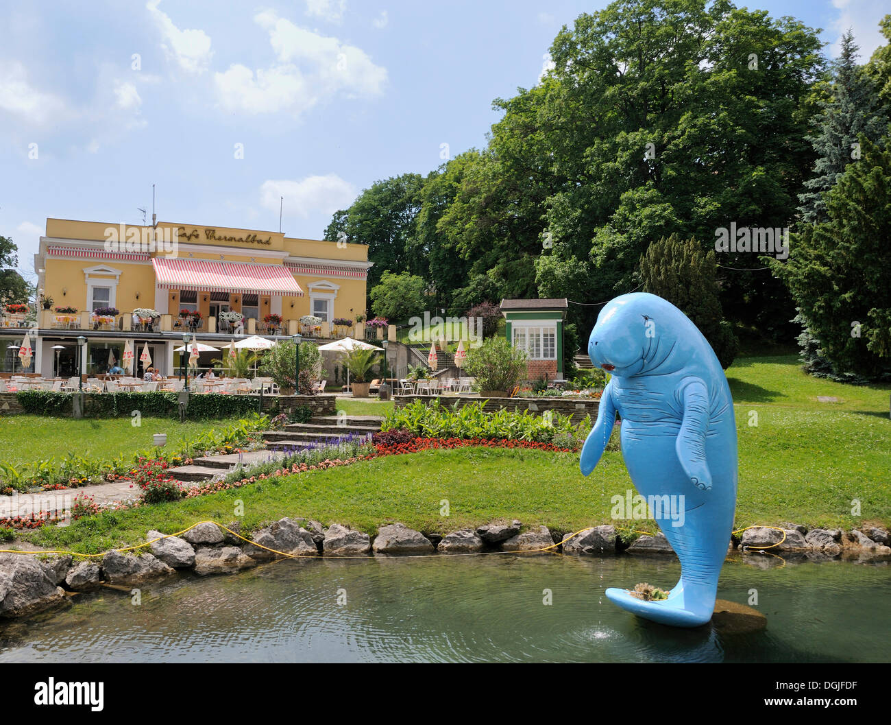 Blue Sea Cow statue, Linda, in the pond in front of Cafe Thermalbad, Bad Voeslau, Lower Austria, Austria, Europe Stock Photo