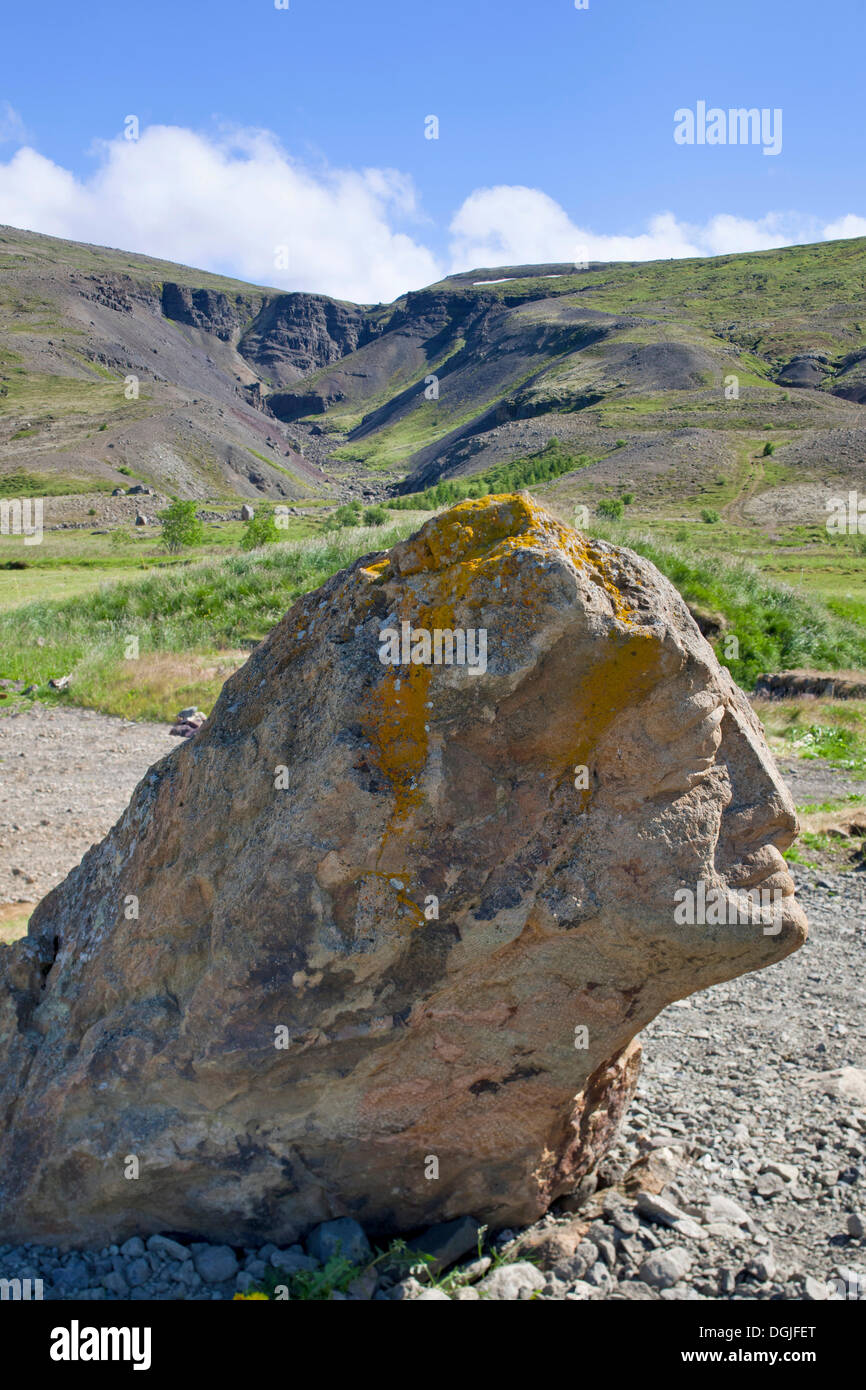 Stone sculpture by Páll Guðmundsson, Bæjarfell Gorge at back, Húsafell, Iceland, Europe Stock Photo
