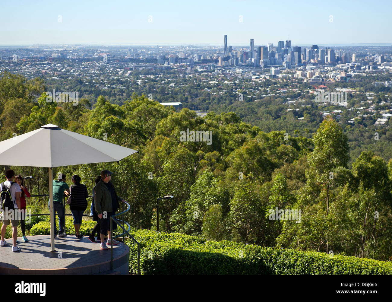 Tourists looking out over the city of Brisbane from the summit of Mt Coot-Tha. Stock Photo