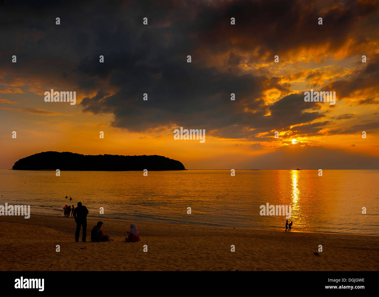 A Spectacular Sunset Over Pantai Tengah Beach In Langkawi Stock Photo a-spectacular-sunset-over-pantai-tengah-beach-in-langkawi-stock-photo
