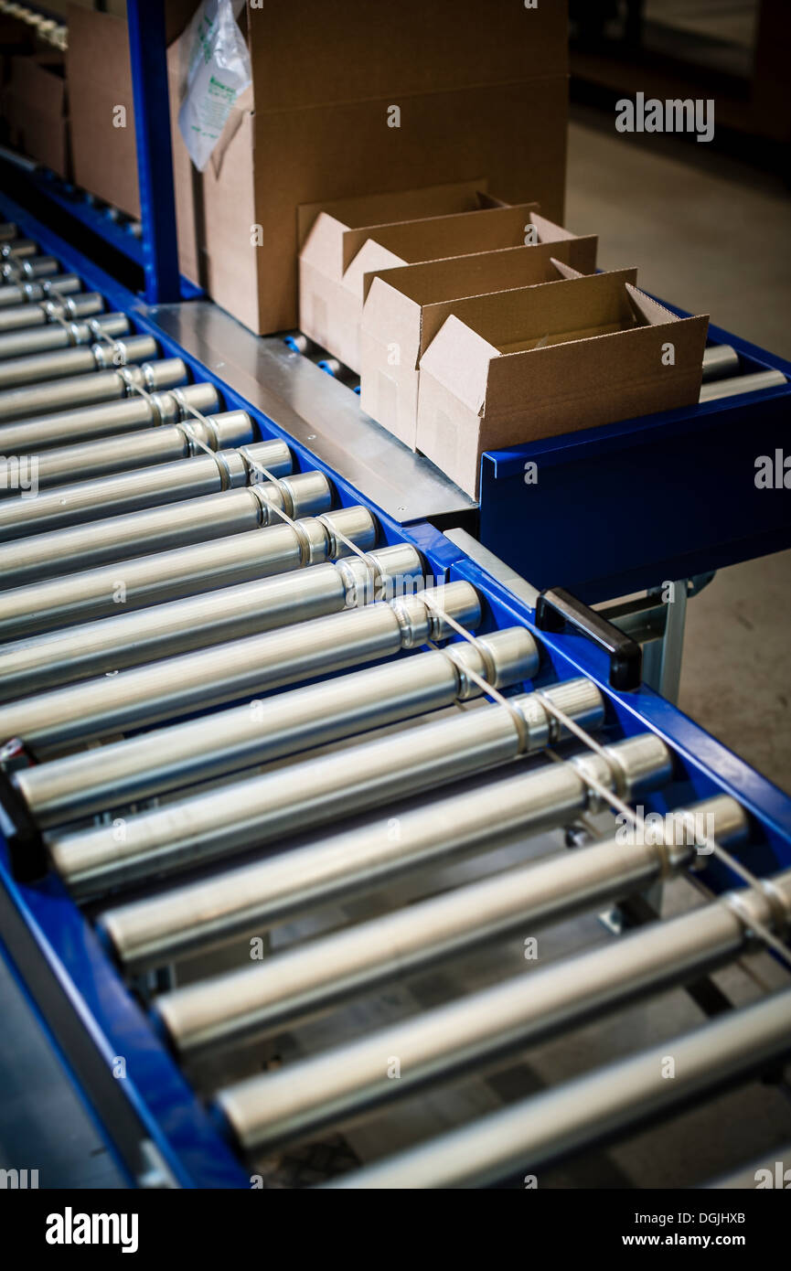 Detail of stationary conveyer belt in distribution warehouse Stock Photo