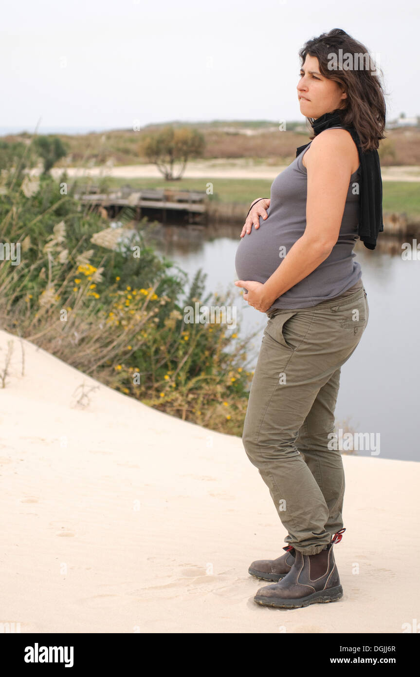 pregnant woman (nine months) in nature Model Release Available Stock Photo