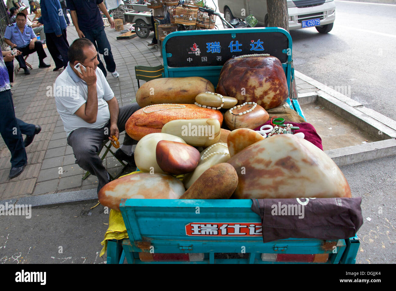 Stone dealer at the market of Tianjiao, Beijing, China, People's Republic of China Stock Photo