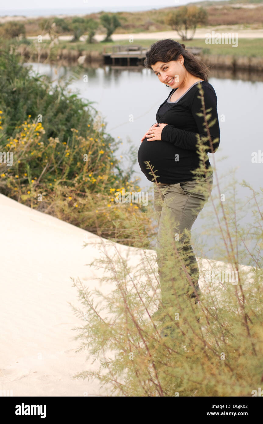 pregnant woman (nine months) in nature Model Release Available Stock Photo
