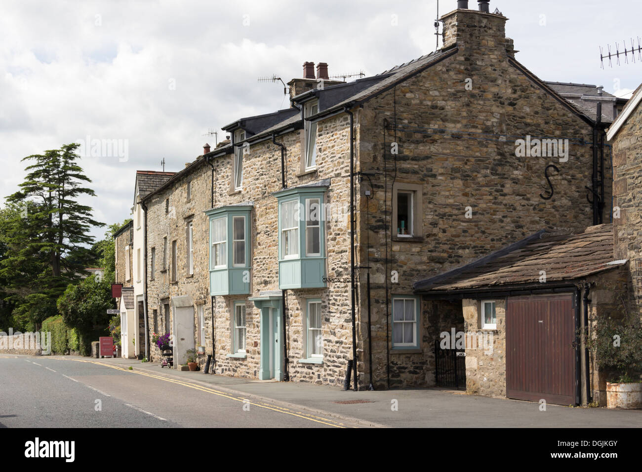 Grade II listed,18th century random rubble wall construction houses on