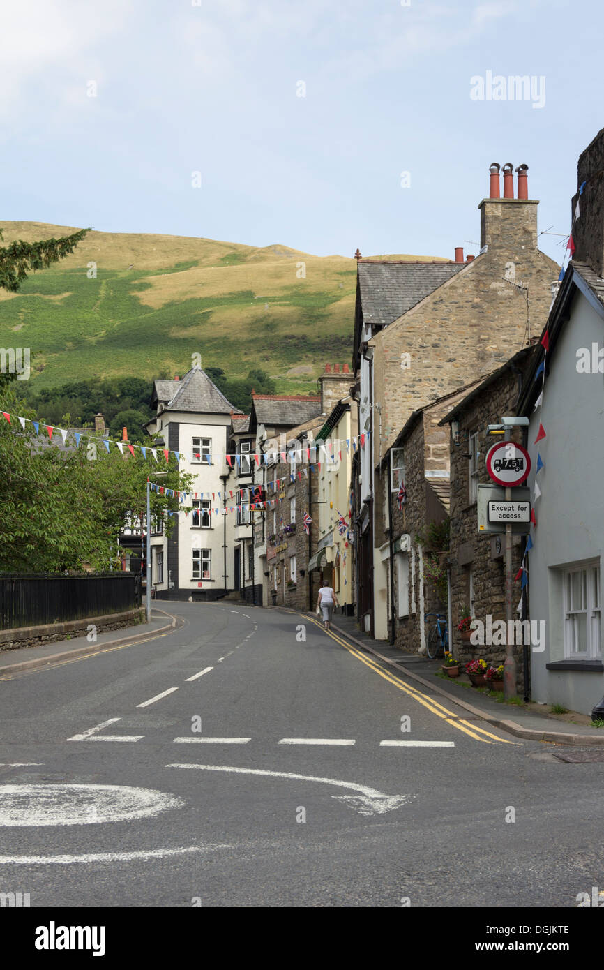 Finkle Street, Sedbergh, Cumbria, looking north from its junction with Back Lane. Beyond is Winder hill and Howgill Fells. Stock Photo