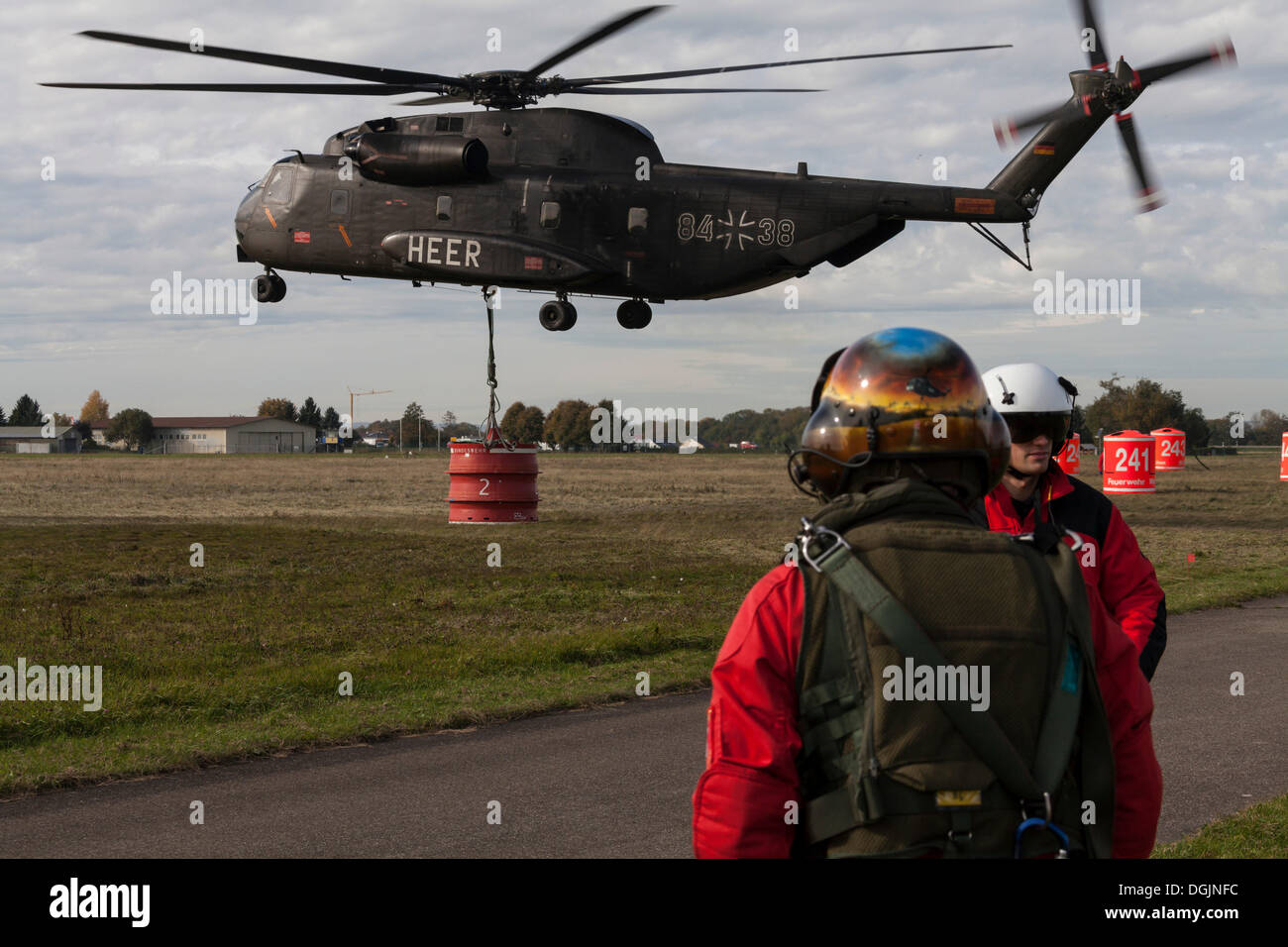 CH53 helicopter carrying a 5000liter water tank during an exercise
